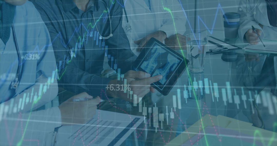 Diverse Doctors Analyzing Medical Data Using Digital Technology