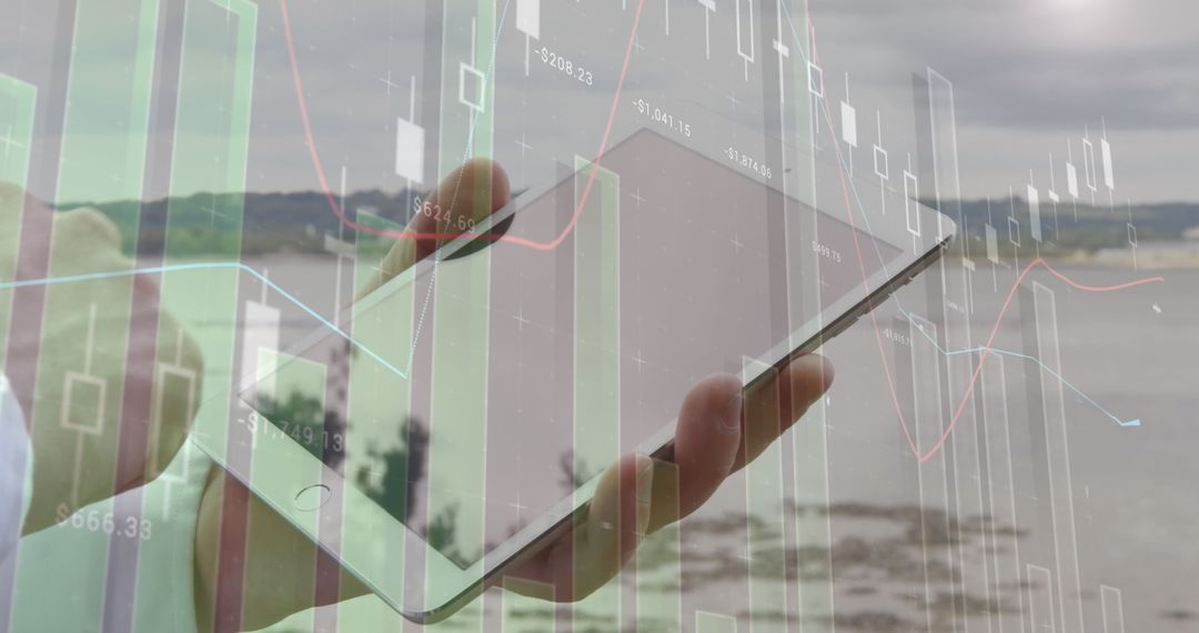 Hand Holding Smartphone with Financial Charts Overlay