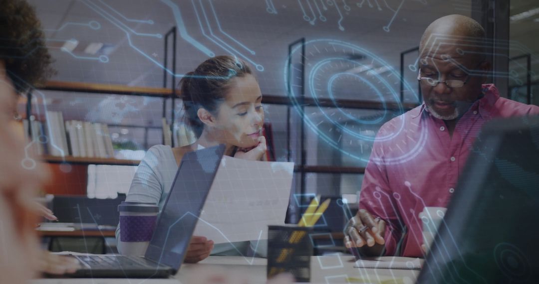 Diverse Team Collaborating with High-Tech Interface Overlay