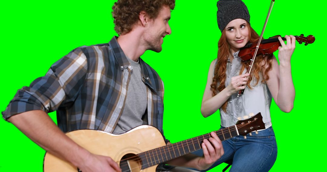 Young Musicians Playing Guitar and Violin on Green Screen - Free Images, Stock Photos and Pictures on Pikwizard.com