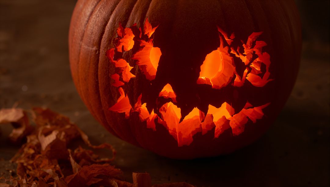 Spooky Glowing Jack-o'-Lantern with Intricate Carvings