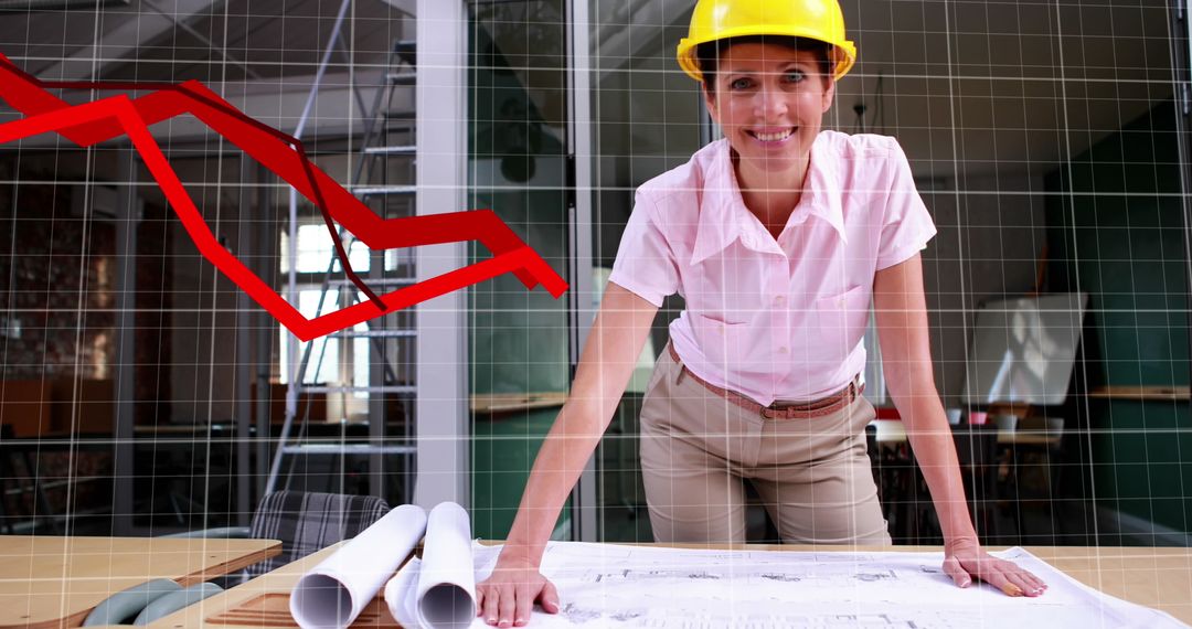 Female Engineer Analyzing Architectural Plans with Falling Economy Graph