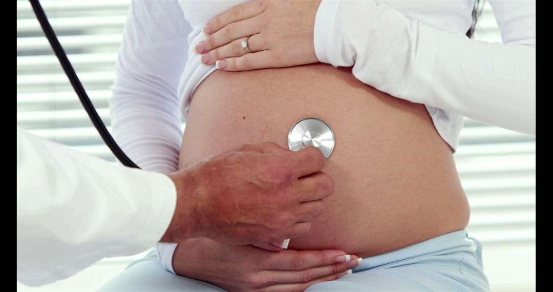 Doctor Examining Pregnant Woman's Belly with Stethoscope - Free Images, Stock Photos and Pictures on Pikwizard.com