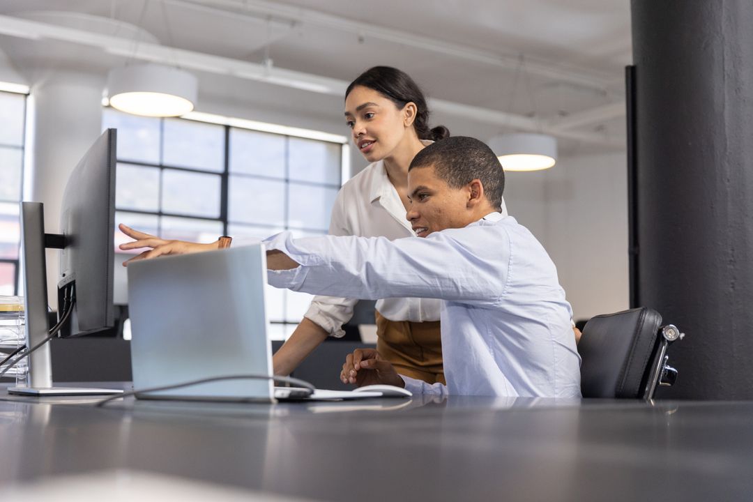 Diverse Colleagues Engaging in Focused Project Collaboration