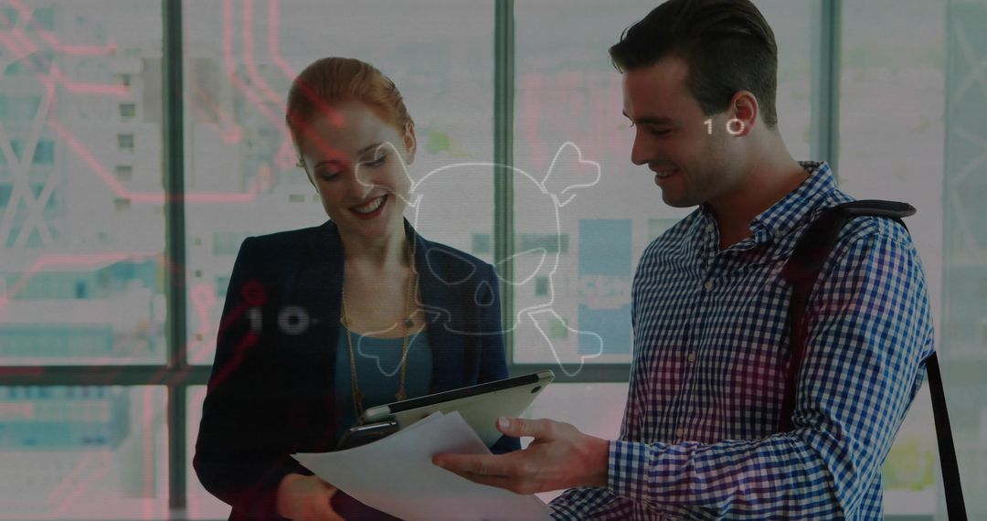 Business colleagues reviewing documents and tablet with cybersecurity overlay in glass office