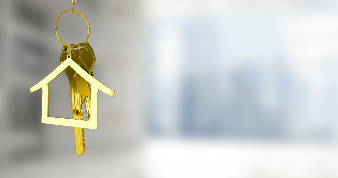 Golden Keys with House Keychain on Blurred Background