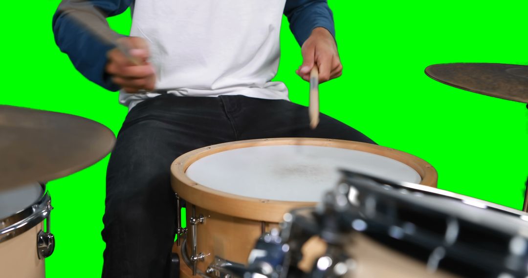 Young Drummer Playing Drum Set with Green Screen Background - Free Images, Stock Photos and Pictures on Pikwizard.com