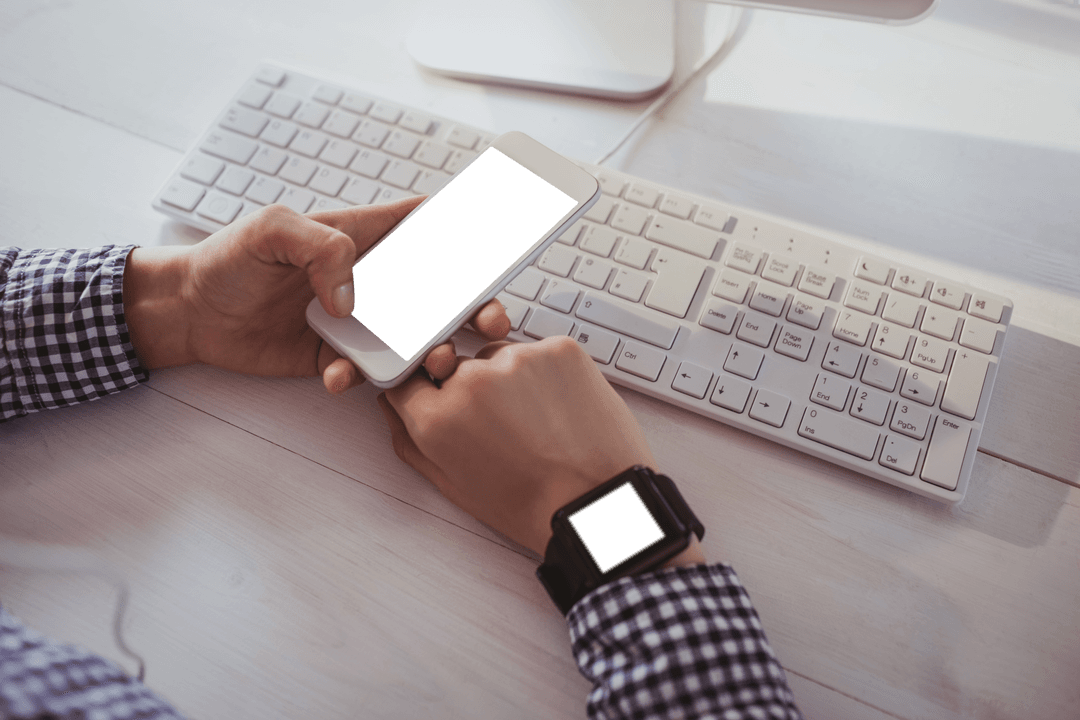 Transparent Screens on Smartphone and Smartwatch at Office Desk