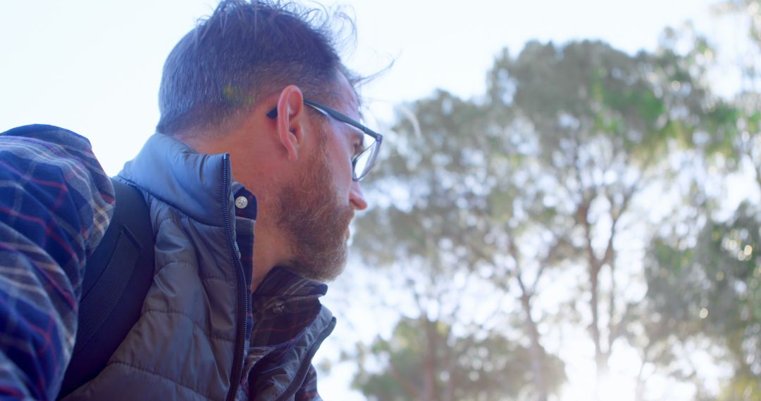 Adventurous Man Enjoying Sunny Day in Nature
