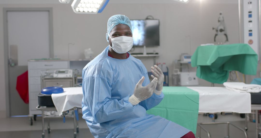 Surgeon Preparing for Operation in Modern Operating Room - Free Images, Stock Photos and Pictures on Pikwizard.com