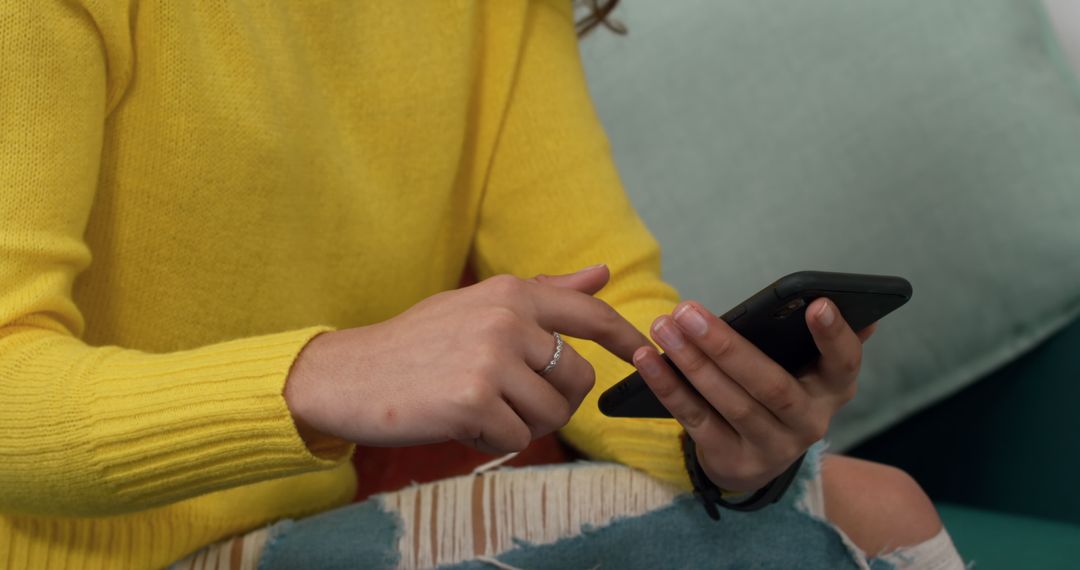 Person Texting on Smartphone While Sitting - Free Images, Stock Photos and Pictures on Pikwizard.com