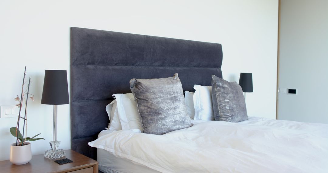 Modern Bedroom with Grey Headboard and Minimalist Design