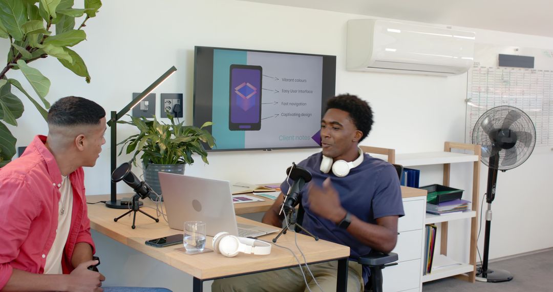 Diverse Team Collaborating in Modern Office for Podcast Recording