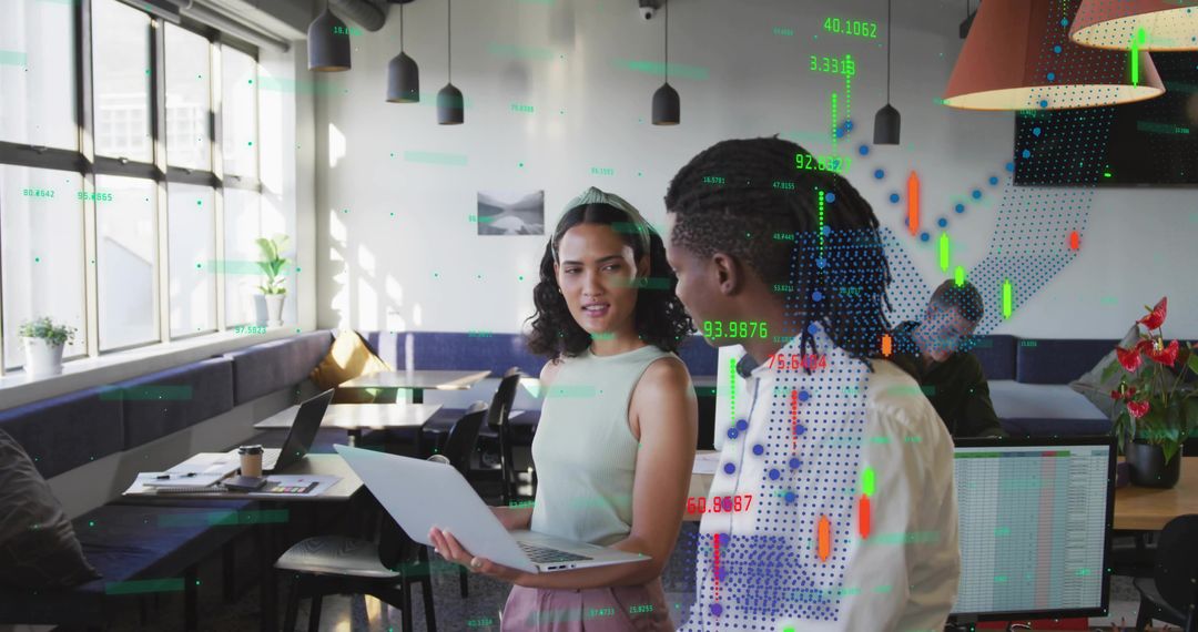 Dynamic Office Team Collaborating over Technology in Modern Workspace