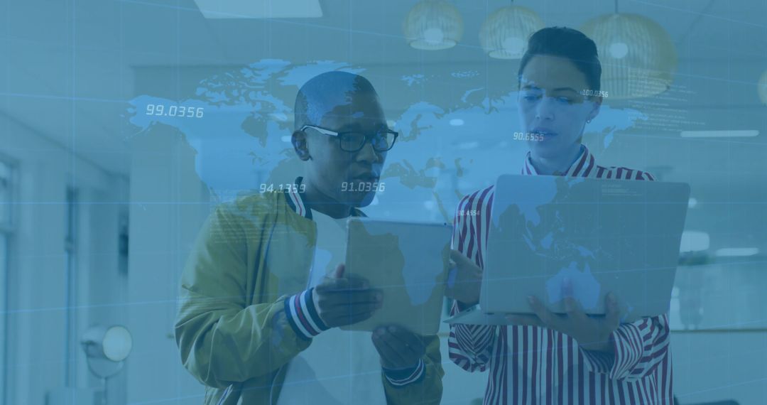 Digital Collaboration Team Analyzing World Map Data in Office Environment