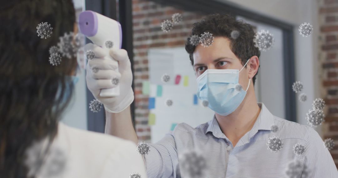 Masked Man Measuring Temperature Amid Virtual COVID-19 Virus Particles