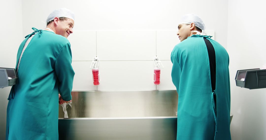 Surgeons Scrubbing Hands Before Surgery in Medical Facility - Free Images, Stock Photos and Pictures on Pikwizard.com