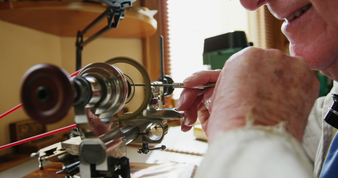 Expert Horologist Using Precision Tool in Workshop Setting - Free Images, Stock Photos and Pictures on Pikwizard.com