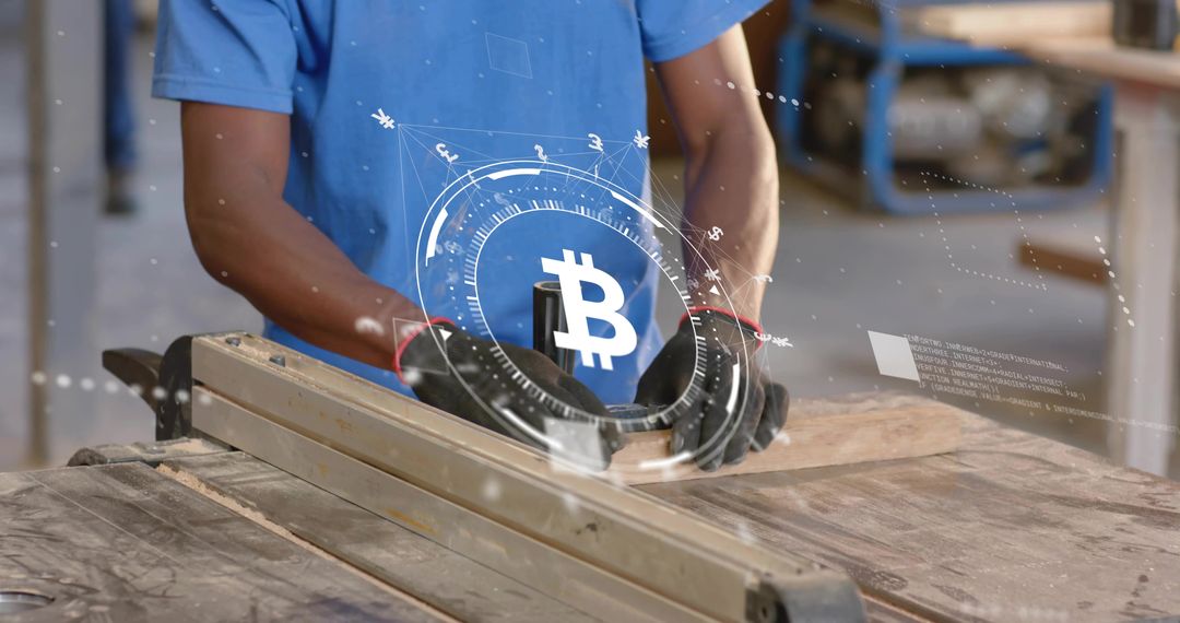Gloved Carpenter Guiding Wood into Table Saw with Bitcoin Hologram Overlay for Industrial Innovation
