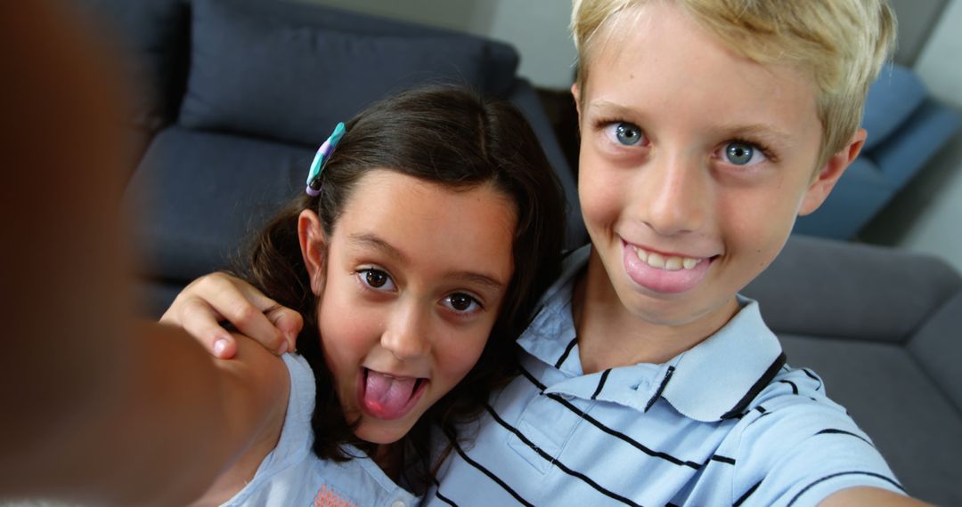 Young Caucasian Boy and Girl Taking Selfie at Home - Free Images, Stock Photos and Pictures on Pikwizard.com