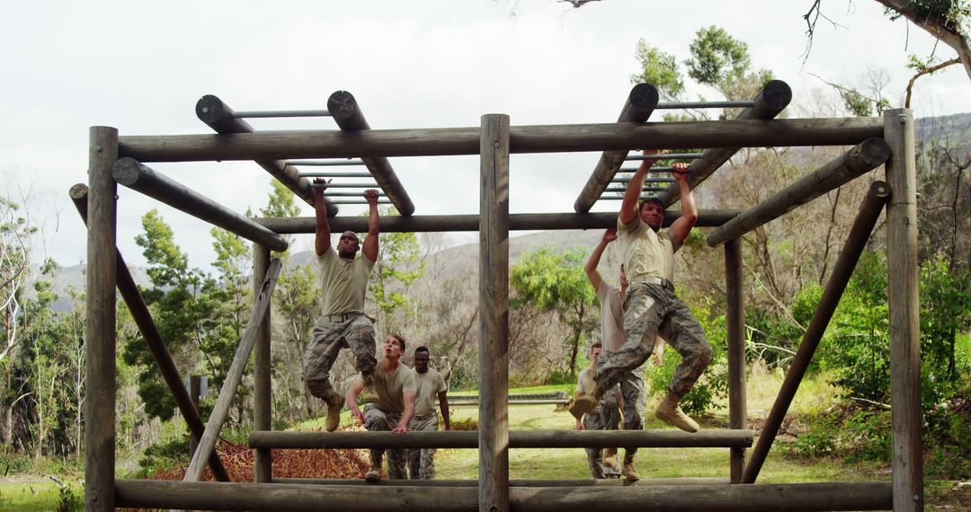 Military training exercise on obstacle course with soldiers in camouflage - Free Images, Stock Photos and Pictures on Pikwizard.com