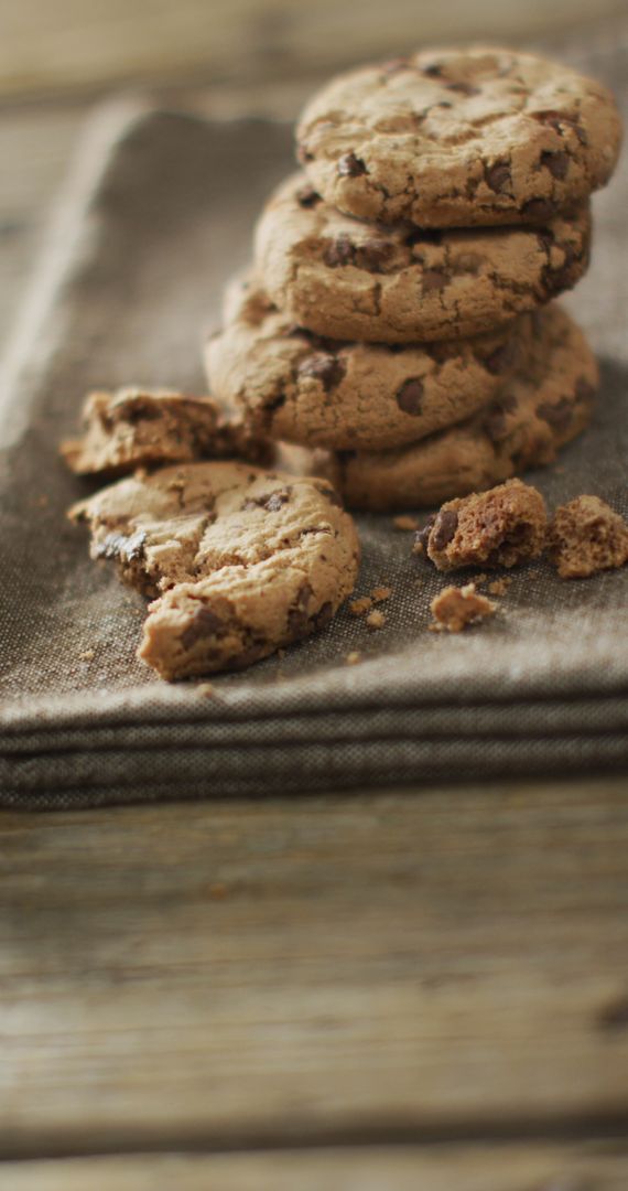 Stack of Fresh Chocolate Chip Cookies on Rustic Cloth