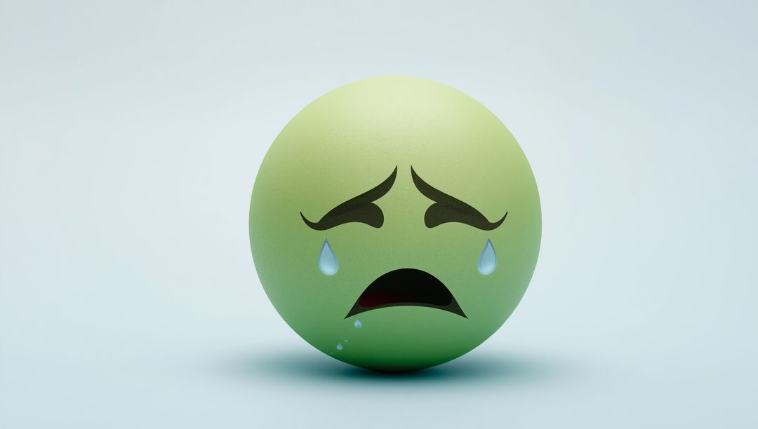 Green Emotive Sphere with Tears Expressing Sadness