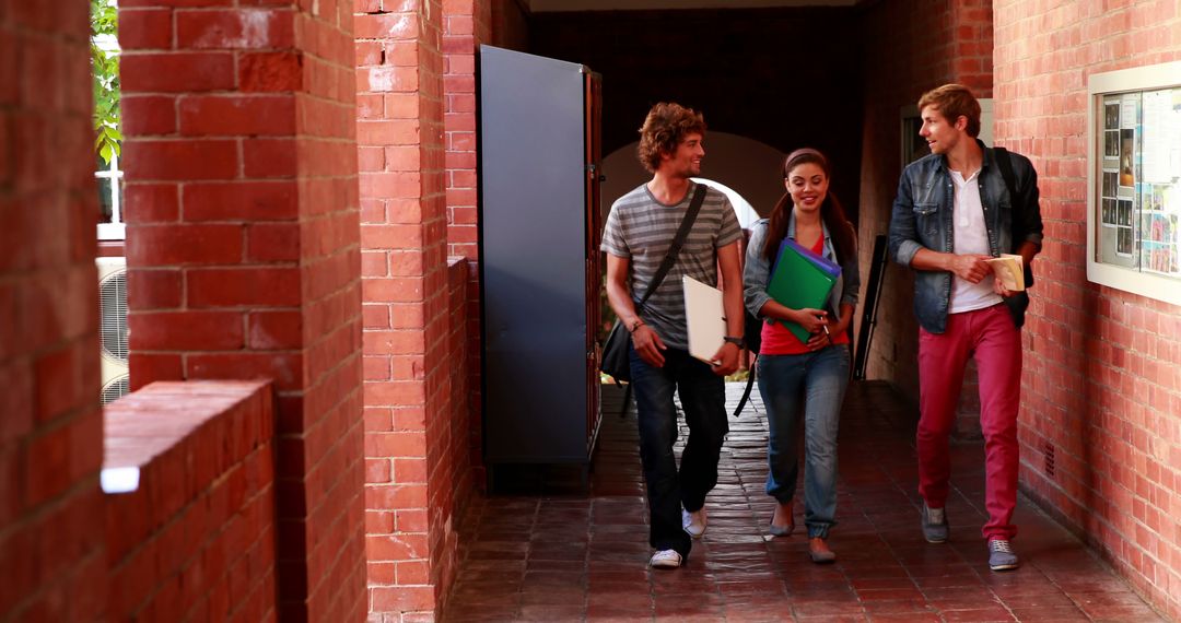 University Students Walking in Campus Hallway - Free Images, Stock Photos and Pictures on Pikwizard.com