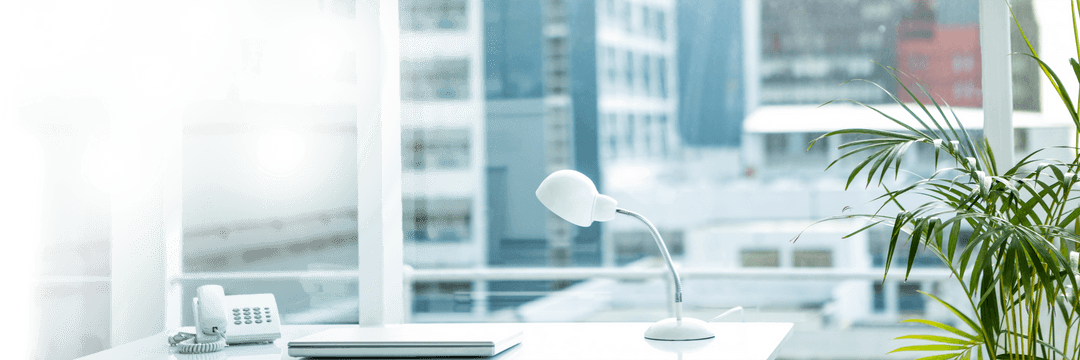 Modern Transparent Office with Desk and City View