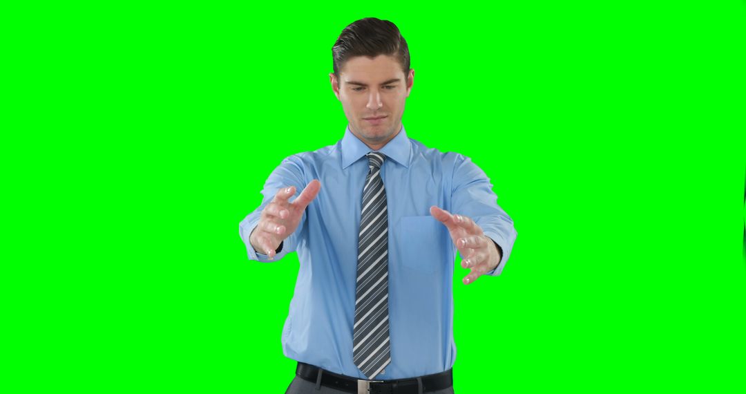 Businessman Using Holographic Virtual Interface on Green Screen