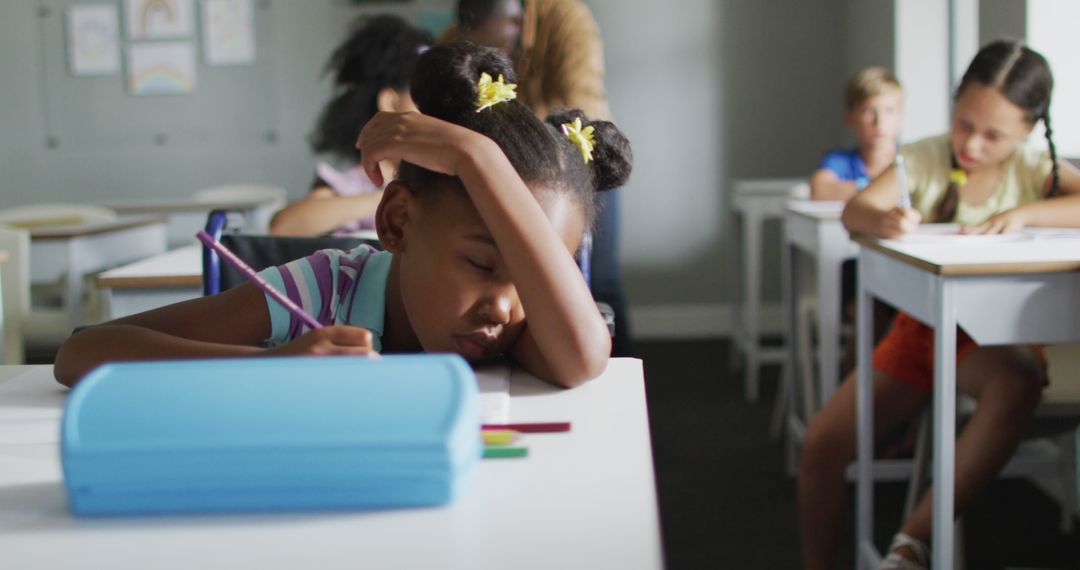 Thoughtful Girl at Desk in Classroom Contemplating Homework