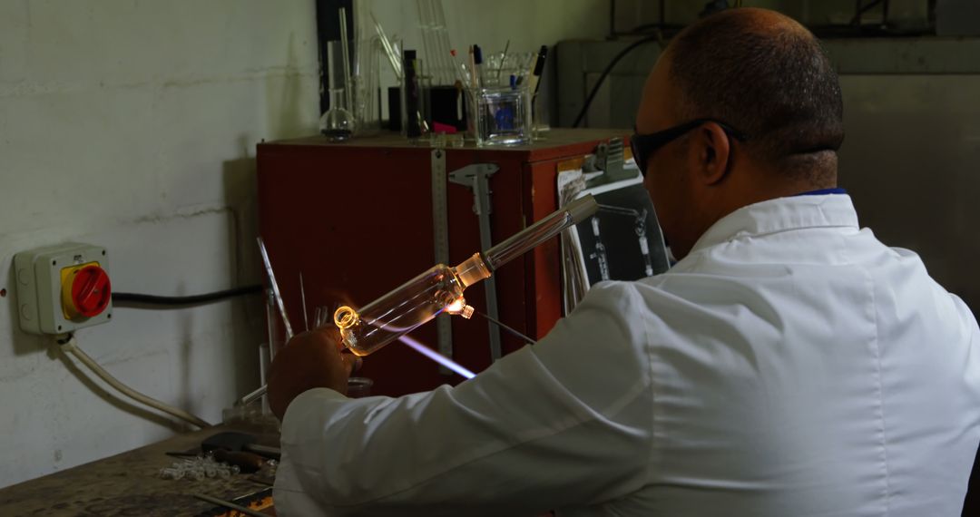 Scientist Working with Glassware in Laboratory - Free Images, Stock Photos and Pictures on Pikwizard.com