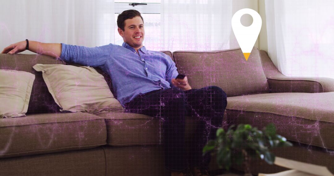 Man Relaxing on Sofa Watching TV with Digital Effects