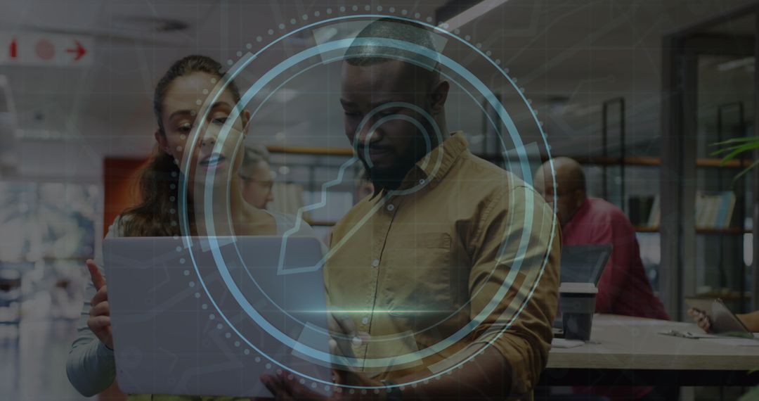 Diverse Team Discussing Cybersecurity Strategy in Office Environment