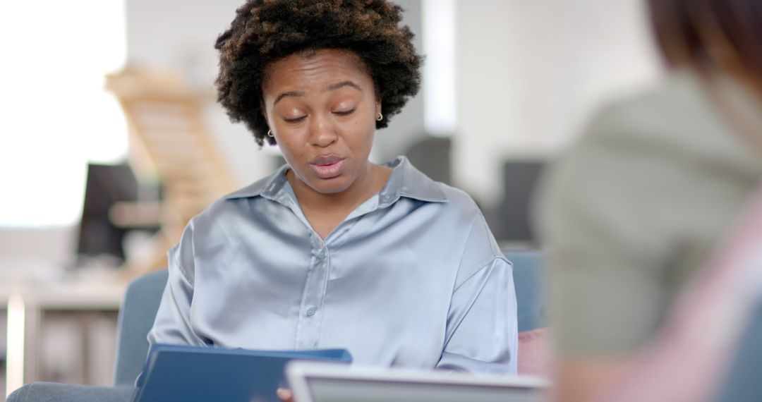 Diverse Female Colleagues Discussing Business Strategy