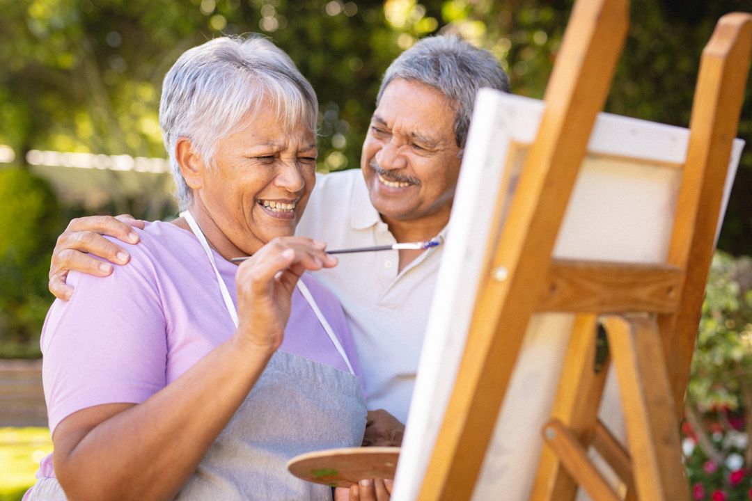 Senior Couple Enjoying Painting Outdoors - Free Images, Stock Photos and Pictures on Pikwizard.com