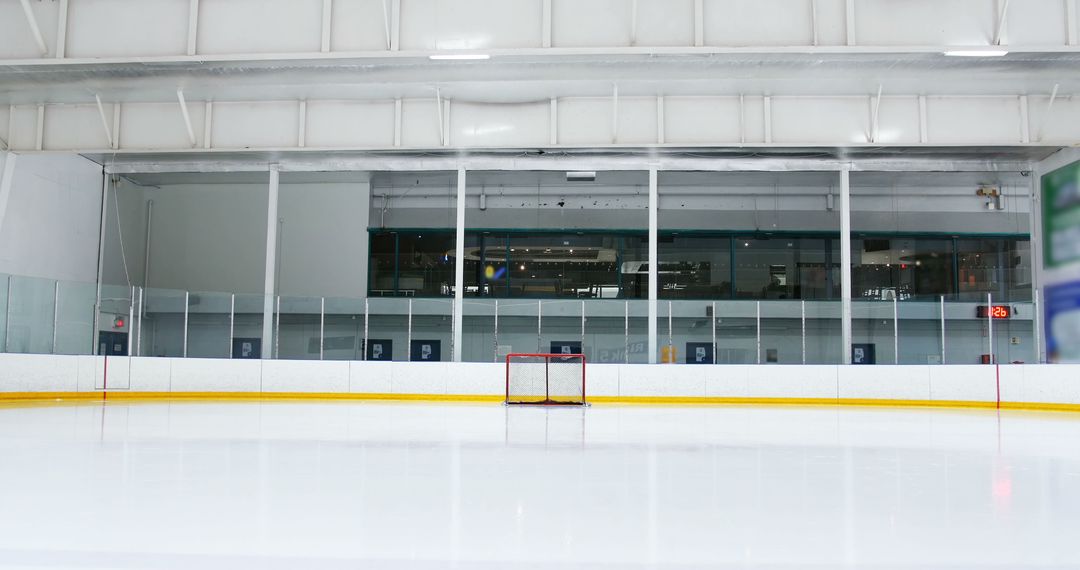 Empty Indoor Ice Hockey Rink with Goalpost - Free Images, Stock Photos and Pictures on Pikwizard.com
