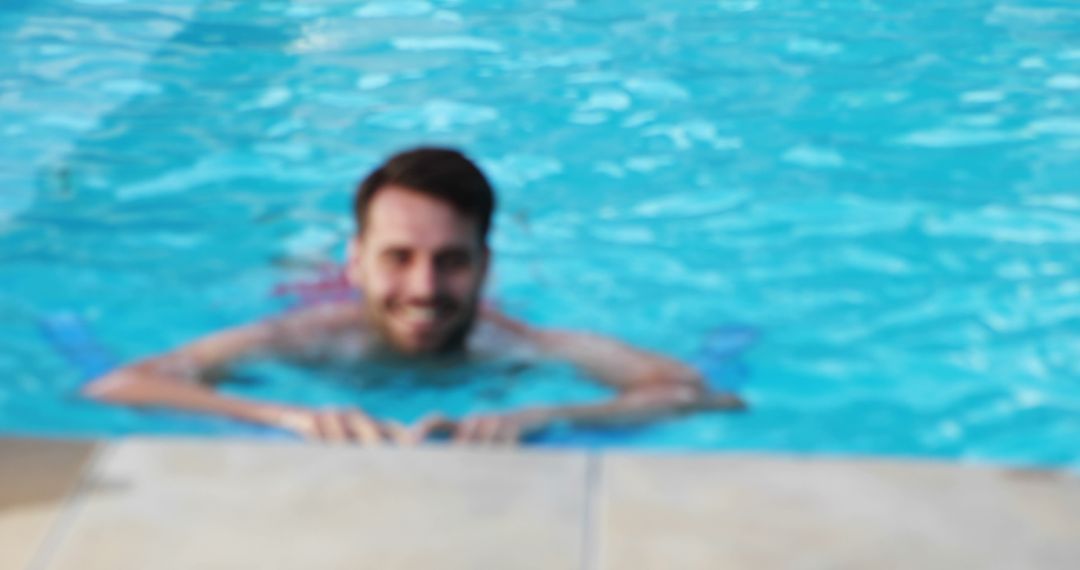 Person Enjoying Swimming Pool with Blurred Effect - Free Images, Stock Photos and Pictures on Pikwizard.com