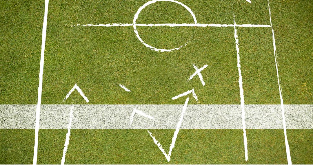 Top View of Football Game Strategy on Green Field