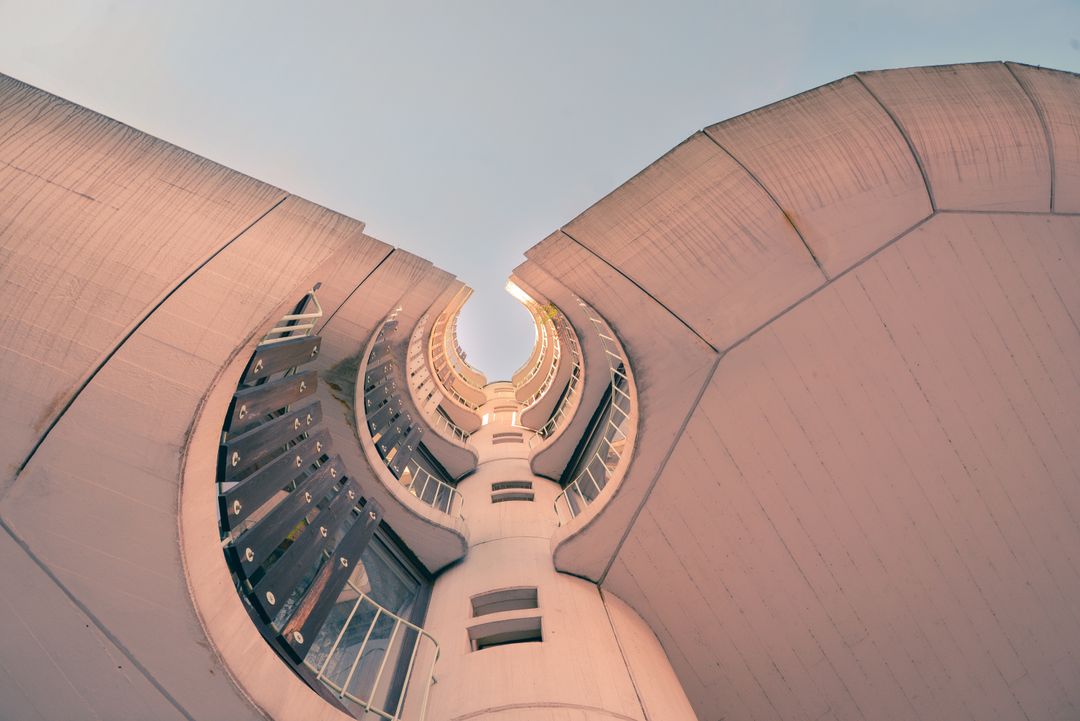 Abstract View of Modern Architectural Tower at Sunset - Free Images, Stock Photos and Pictures on Pikwizard.com