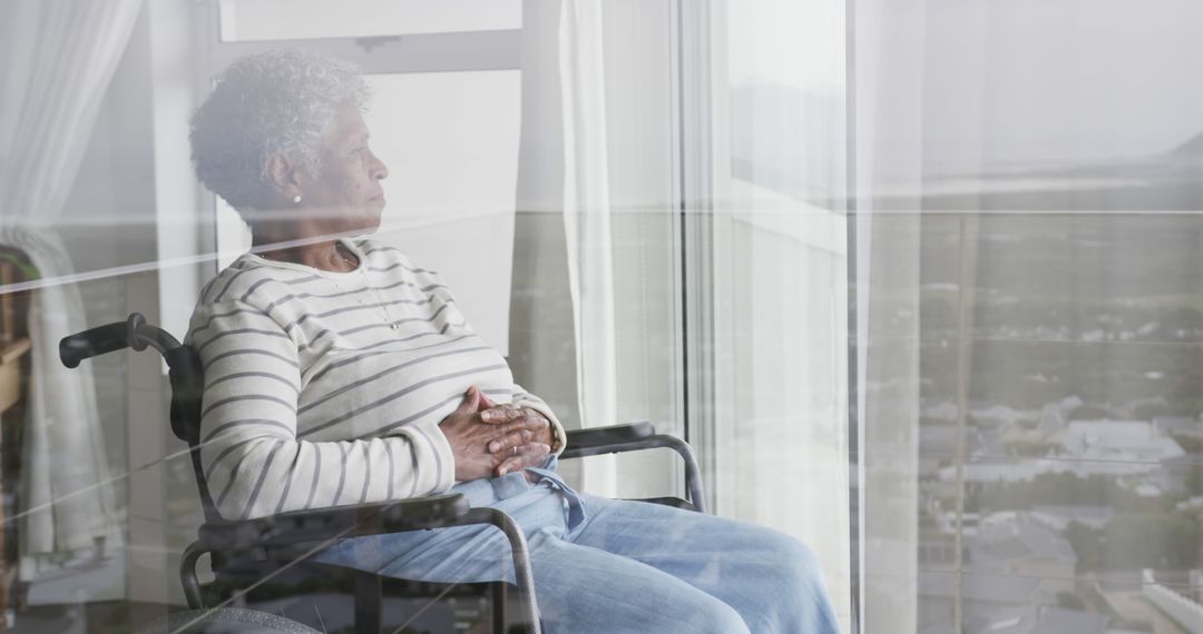 Senior Woman in Wheelchair Looking Out Through Window - Free Images, Stock Photos and Pictures on Pikwizard.com