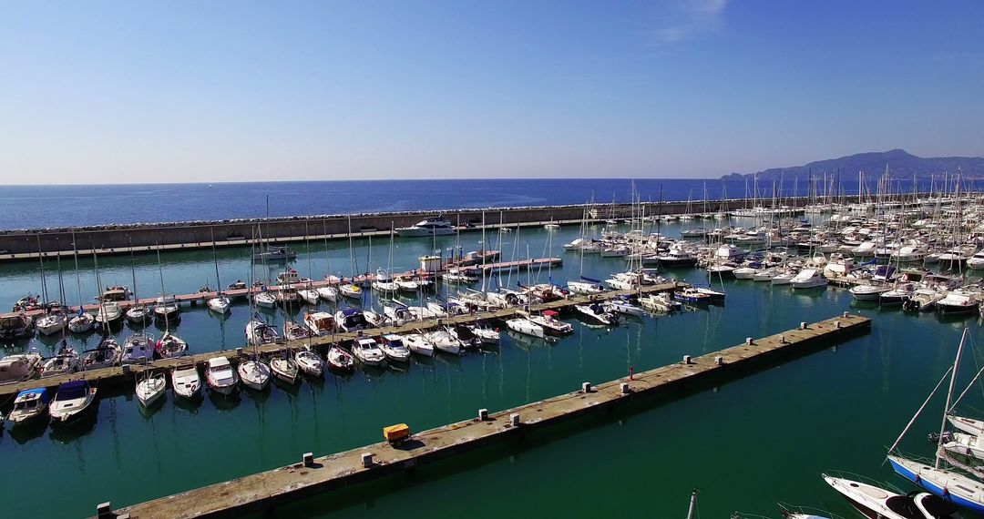 Marina with Moored Boats on a Sunny Day - Free Images, Stock Photos and Pictures on Pikwizard.com