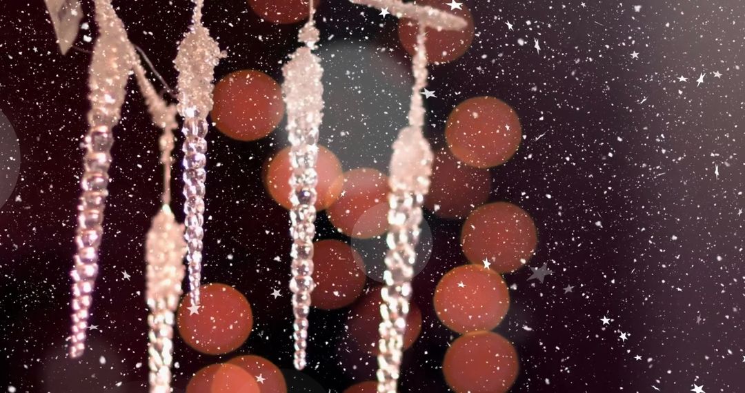 Snowflakes Gently Falling over Elegant Christmas Icicles and Warm Bokeh Lights