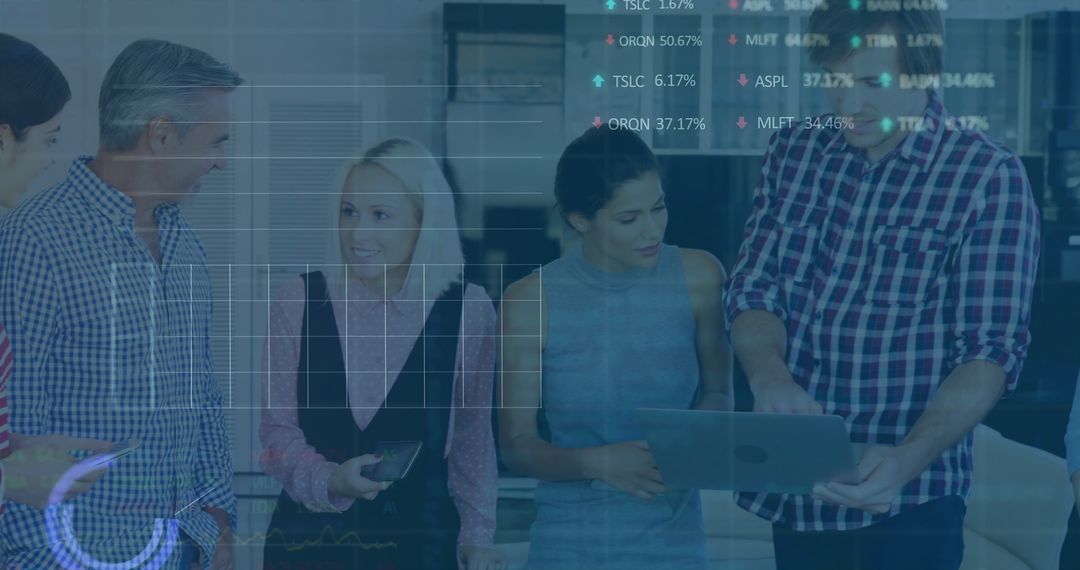 Business Team Analyzing Digital Data within Modern Workspace