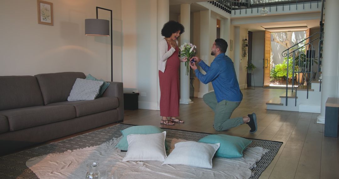 Man Proposing to Woman at Home with Joyful Reactions