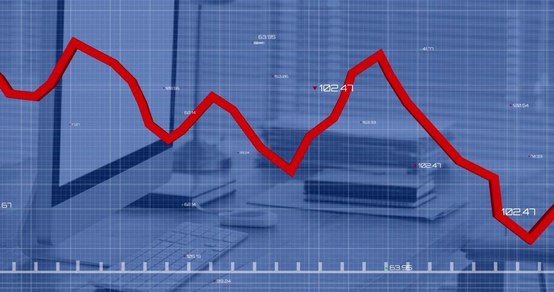 Red Graph Line over Office Workspace Representing Market Trends