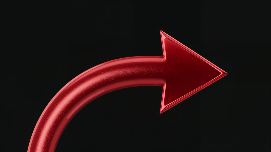 Red metallic curved arrow on black background symbolizing progress and growth