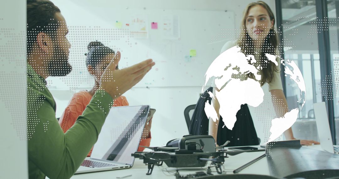 Diverse Team Collaborates on Technology Strategy with Drone and World Map