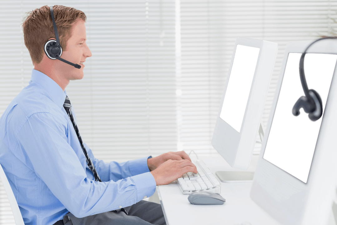 Transparent Businessman Using Computer with Headset in Office