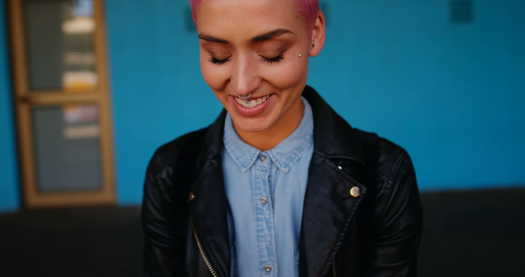 Smiling Young Woman with Pink Hair and Nose Piercing - Free Images, Stock Photos and Pictures on Pikwizard.com